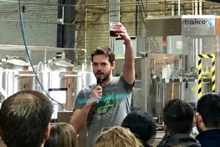 A tour guide speaking to a group