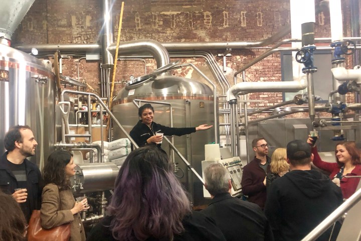 A tour group in a brewery